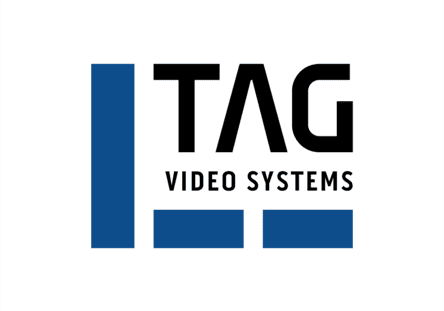 tag_logo.c4315d22 TAG Video Systems-Logo mit schwarzem Text und drei blauen, vertikal angeordneten Rechtecken auf der linken Seite und zwei blauen Rechtecken unter dem Text auf weißem Hintergrund.