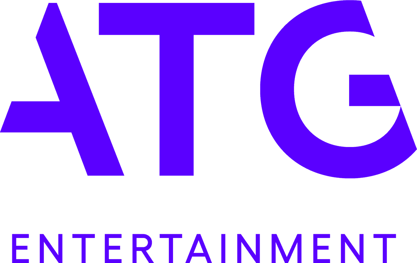 ATG_Entertainment_Logo_Purple Große lilafarbene Buchstaben mit der Aufschrift ATG über dem Wort ENTERTAINMENT in kleinerer lilafarbener Schrift, dargestellt auf weißem Hintergrund.